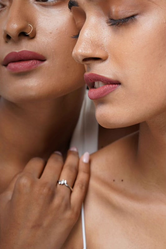 Shades of Beauty: A Brief Journey through the History of Brown Skin Makeup
